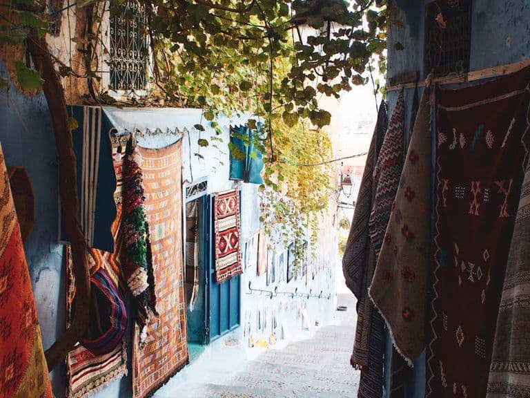 Carpets in a narrow alley